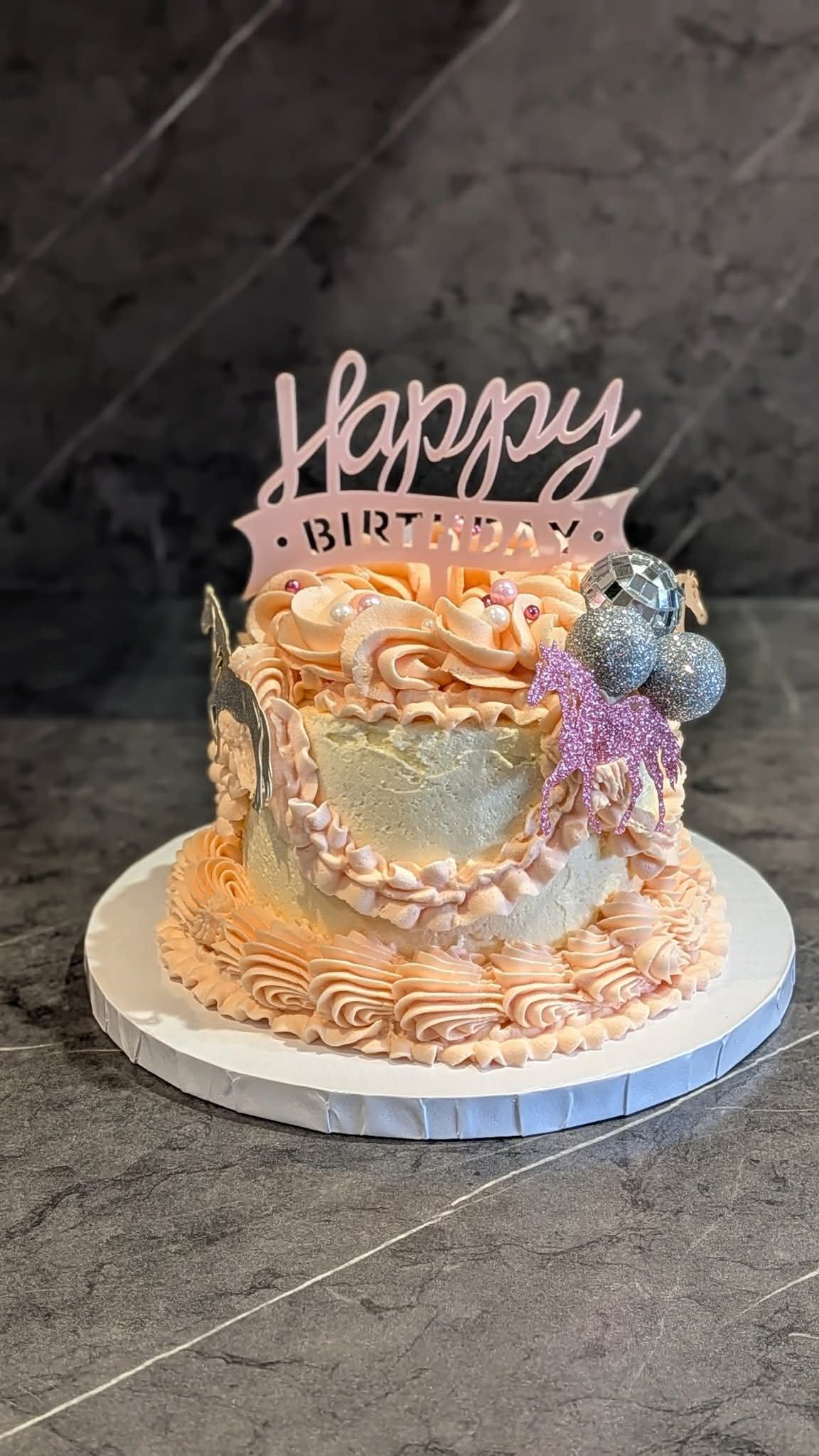 Peach vintage piped birthday cake
