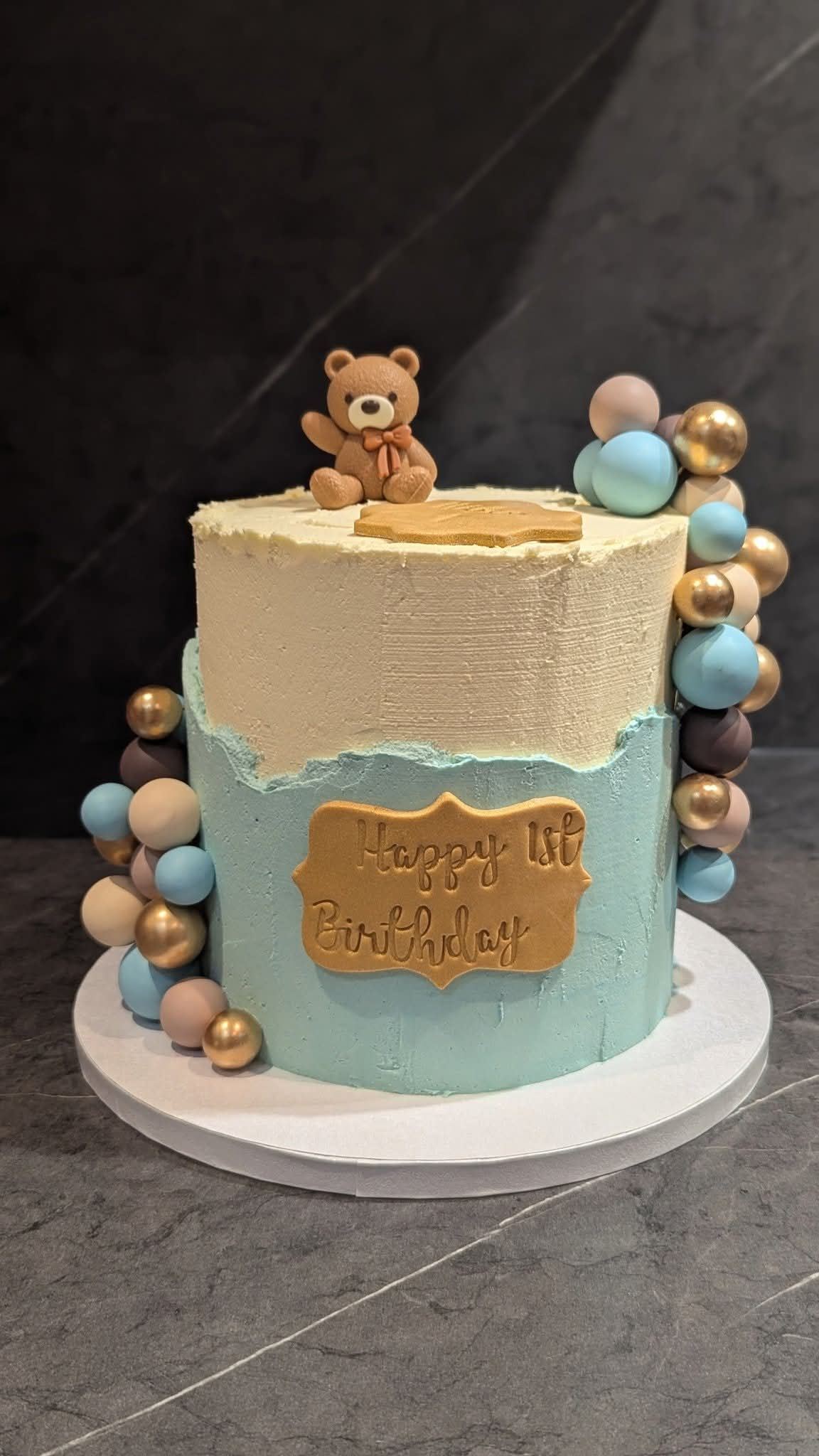 Teddy bear first birthday cake